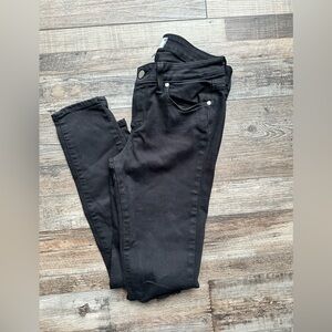 PAIGE  jeans in black with with knee fringe holes on each knee size 28